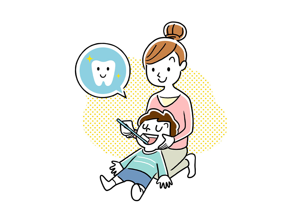 お子さんに仕上げ磨きをする